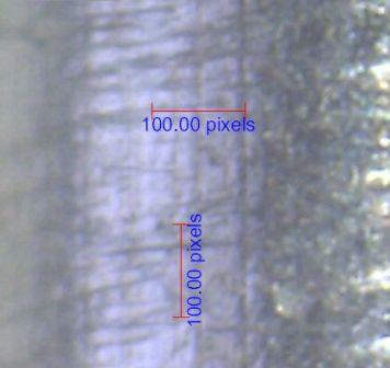 Close up of scratched surface of 304 stainless steel tube.